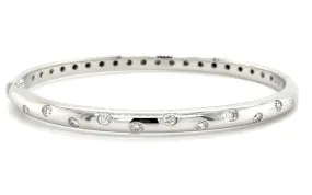 0.55CT TW Burnish Set Diamond Station Bangle Bracelet