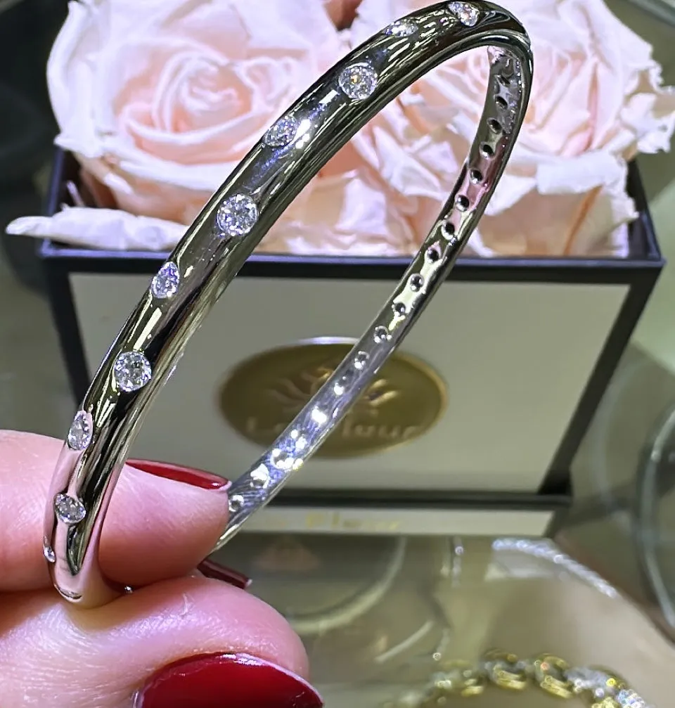 0.55CT TW Burnish Set Diamond Station Bangle Bracelet