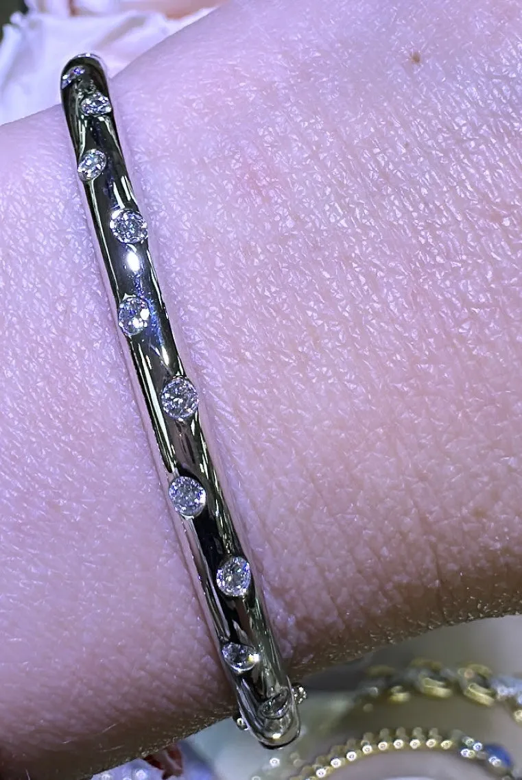 0.55CT TW Burnish Set Diamond Station Bangle Bracelet
