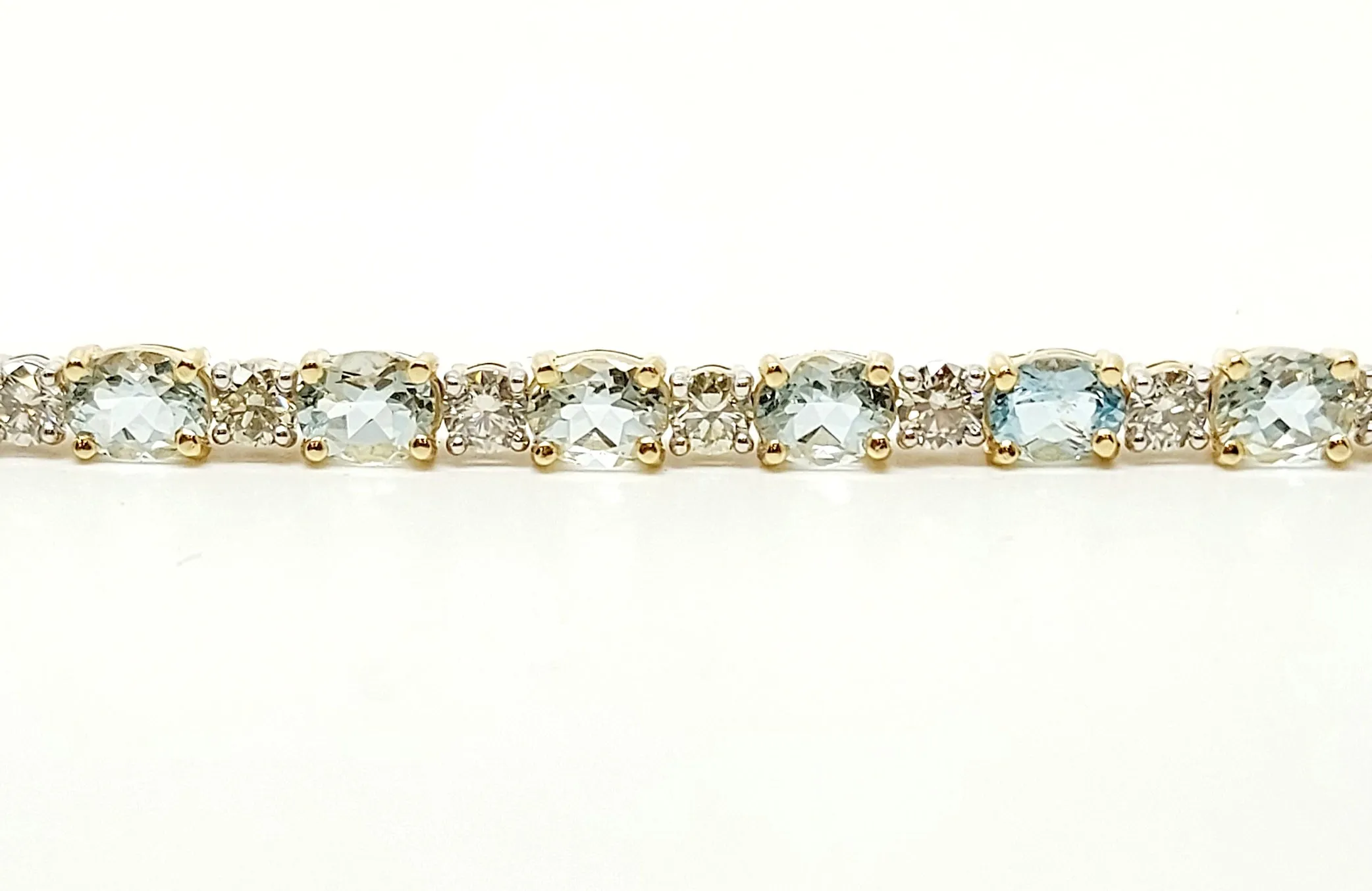 Oval Aquamarine And Round Diamond Bracelet In 14k Yellow Gold